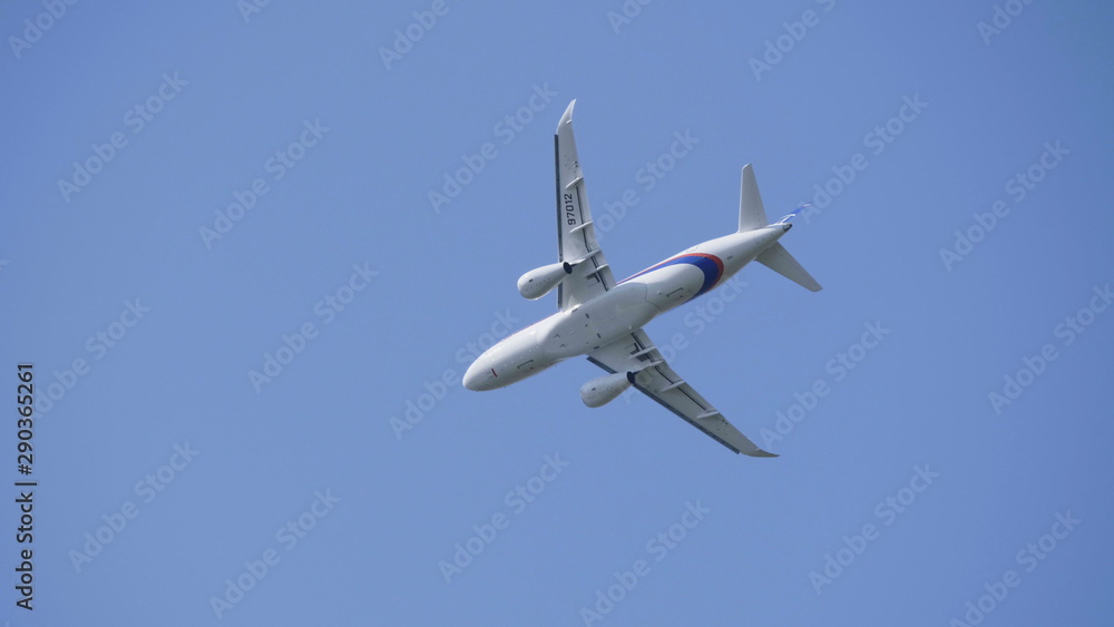 Moscow Russia Zhukovsky Airfield 31 August 2019: Commercial passenger airplane Sukhoi Superjet 100 flying demonstration flight of the international aerospace salon MAKS-2019 Moscow Russia Zhukovsky Airfield 31 August 2019: Commercial passenger airplane Sukhoi Superjet 100 flying demonstration flight of the international aerospace salon MAKS-2019