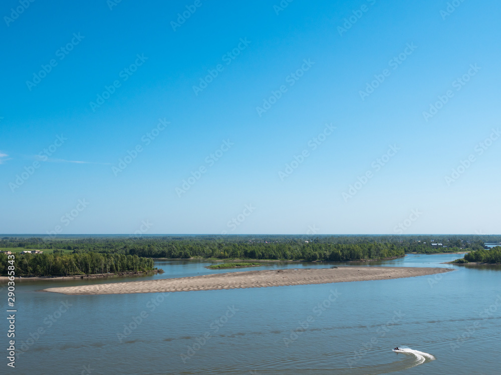 Spilling river in a green forest natural background Spilling river in a green forest natural background