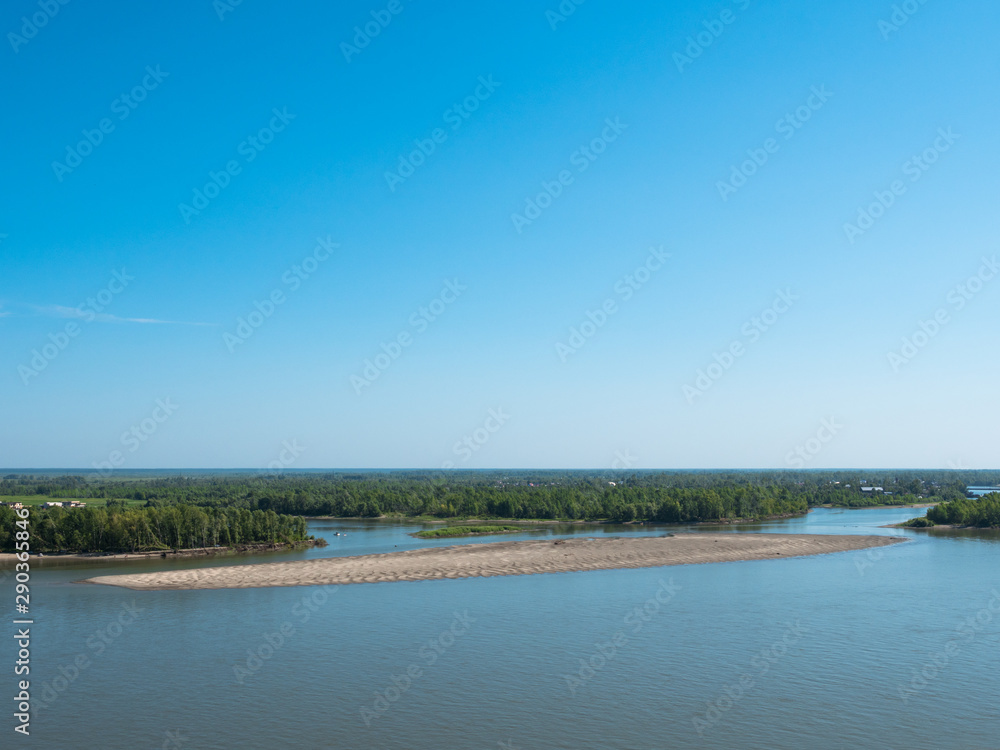 Spilling river in a green forest natural background Spilling river in a green forest natural background