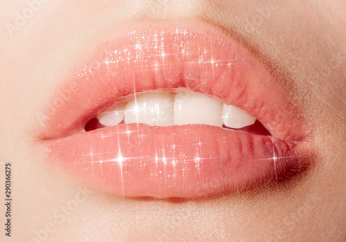 Close up of woman's sparkling lips photo