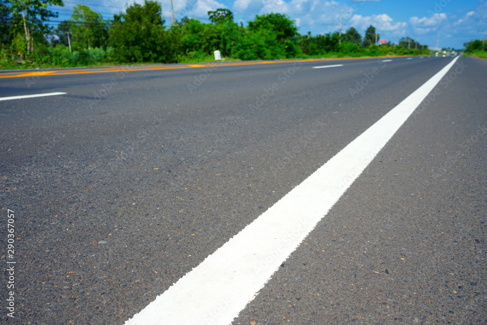 Road traffic paint White on the asphalt surface Road traffic paint White on the asphalt surface