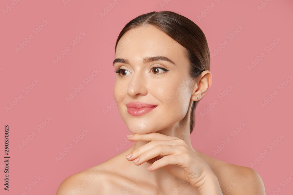 Beautiful woman with perfect smooth skin on pink background Beautiful woman with perfect smooth skin on pink background