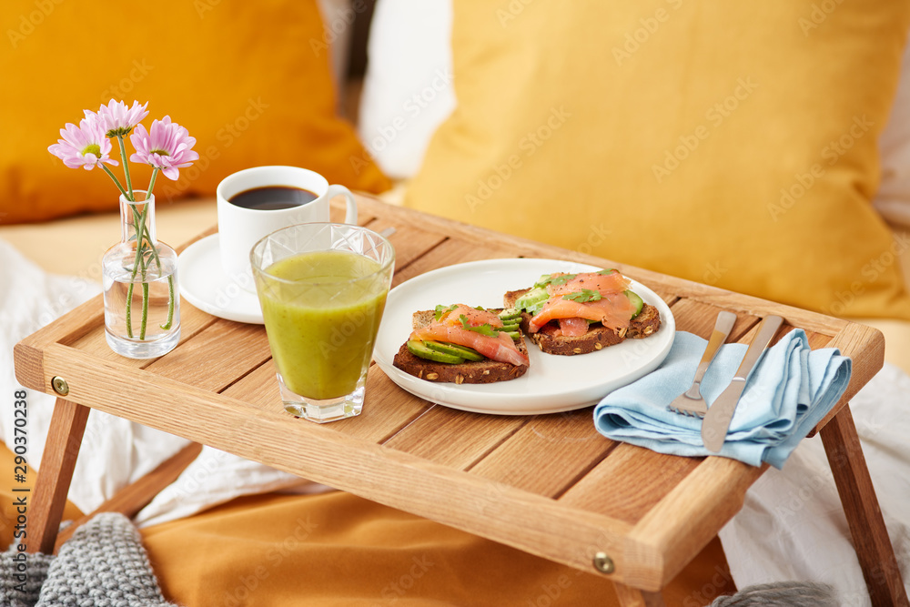 Yummy crunchy sandwiches with salmon and avocado with cup of cof Yummy crunchy sandwiches with salmon and avocado with cup of cof