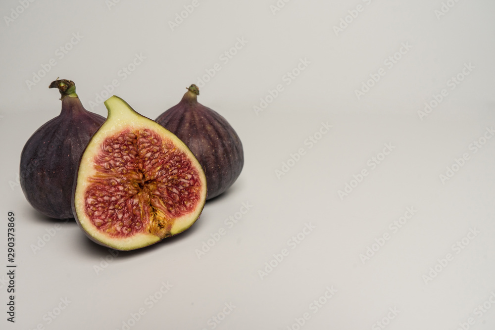Ripe and beautiful figs on a white background. also in the context Ripe and beautiful figs on a white background. also in the context