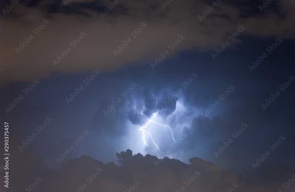 A Lightning at cloudy dark sky scene. A Lightning at cloudy dark sky scene.