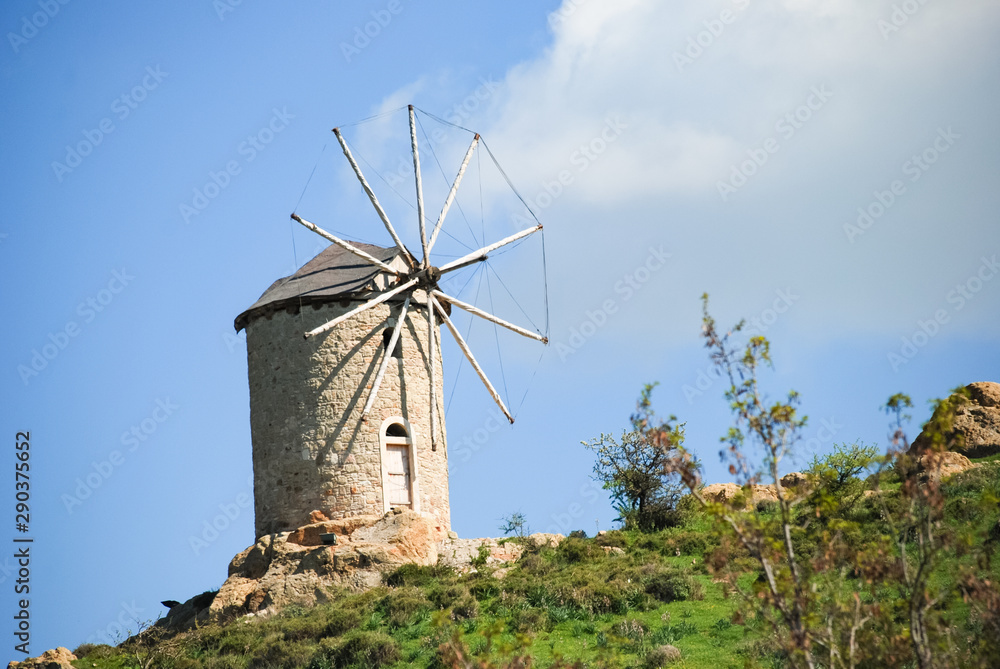 Windmill and Sunny sky at the hill of Foca Town in Izmir.