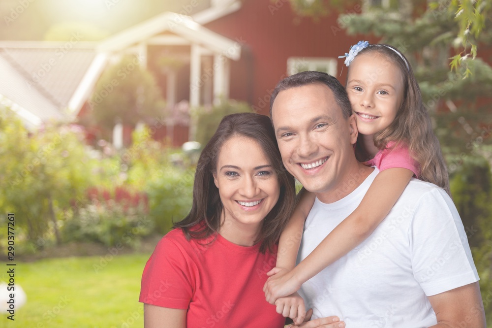 Beautiful smiling Lovely family in park Beautiful smiling Lovely family in park