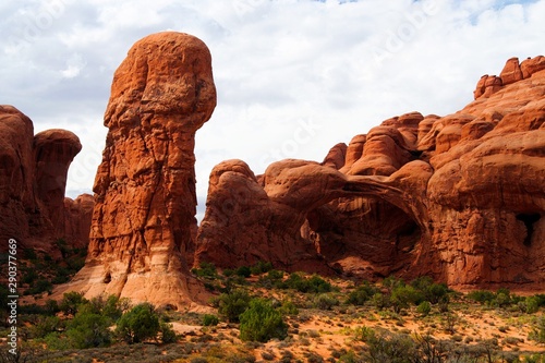 View on funny eroded rugged sandstone formation in dry environment - Penis rock,  Arches national park, Utah