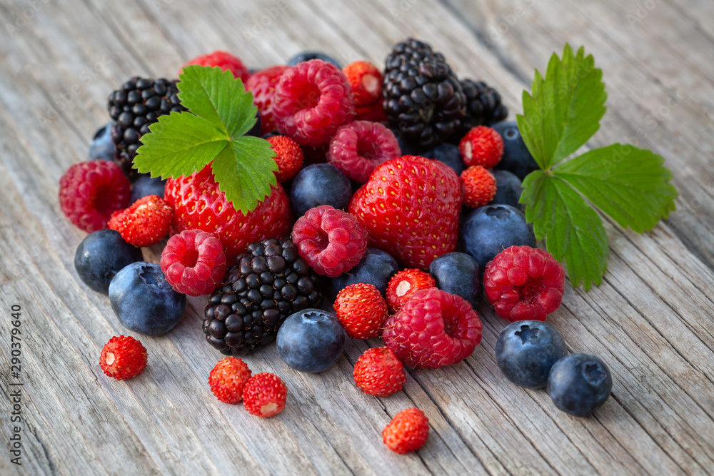 Ripe berries on a wooden board Ripe berries on a wooden board