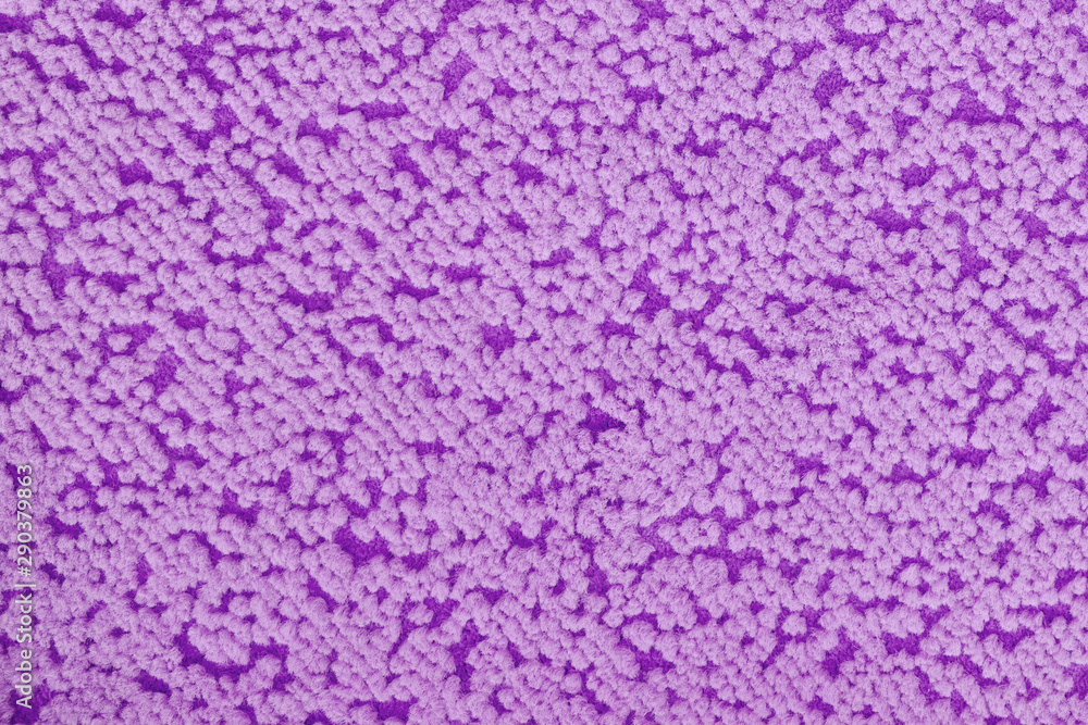 Fabric texture with dots, close up. Rug texture with violet spots. Textile background with purple pattern.