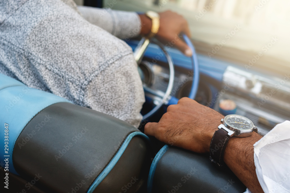 Fototapeta premium Two men in the retro car