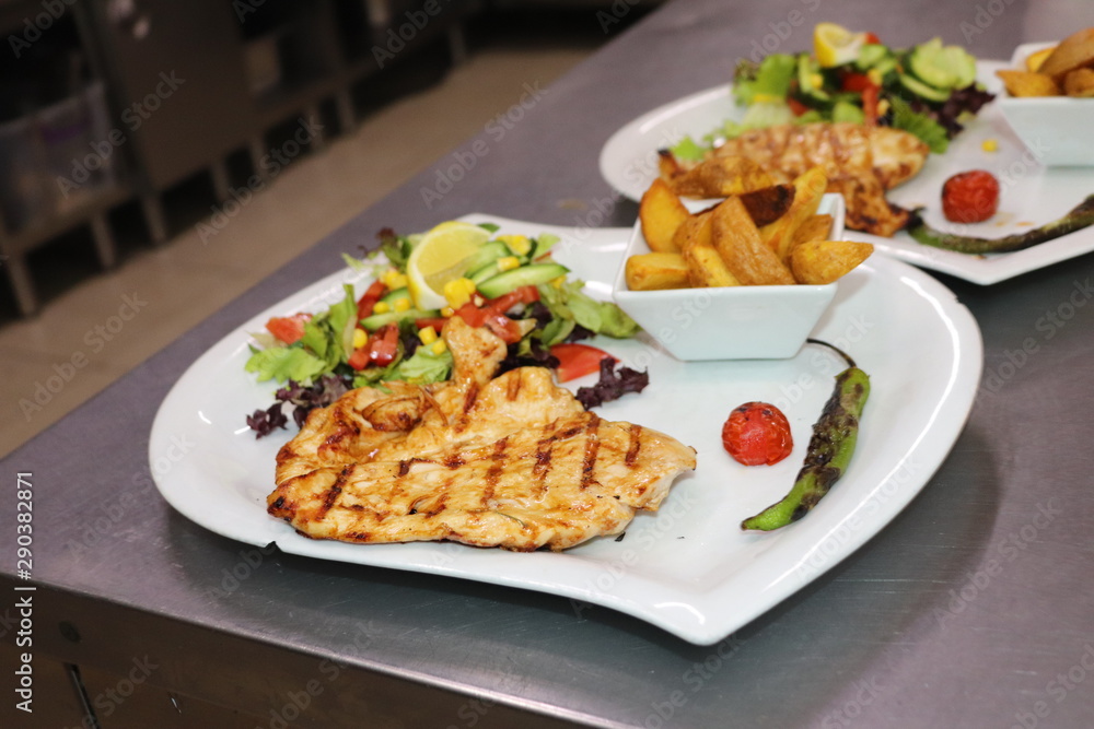 grilled chicken with vegetables on plate grilled chicken with vegetables on plate