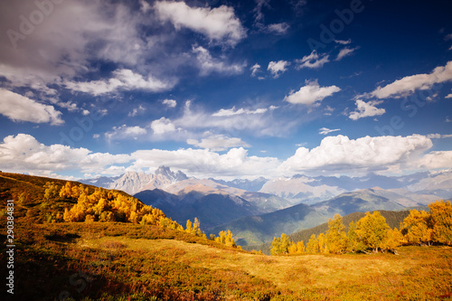 Alpine meadows in the sunny beams. Location Zemo Svaneti, Georgia country, Europe. Main Caucasian ridge.