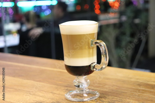 cup of coffee on wooden table