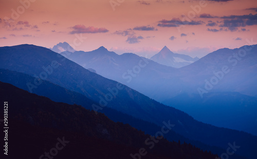 A look at the grand ridge at twilight. Location Upper Svaneti, Georgia country, Europe. Main Caucasian ridge.