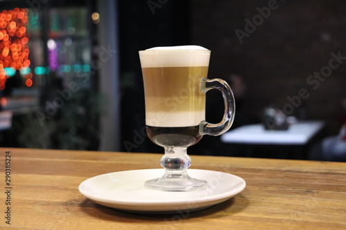 cup of coffee on wooden table