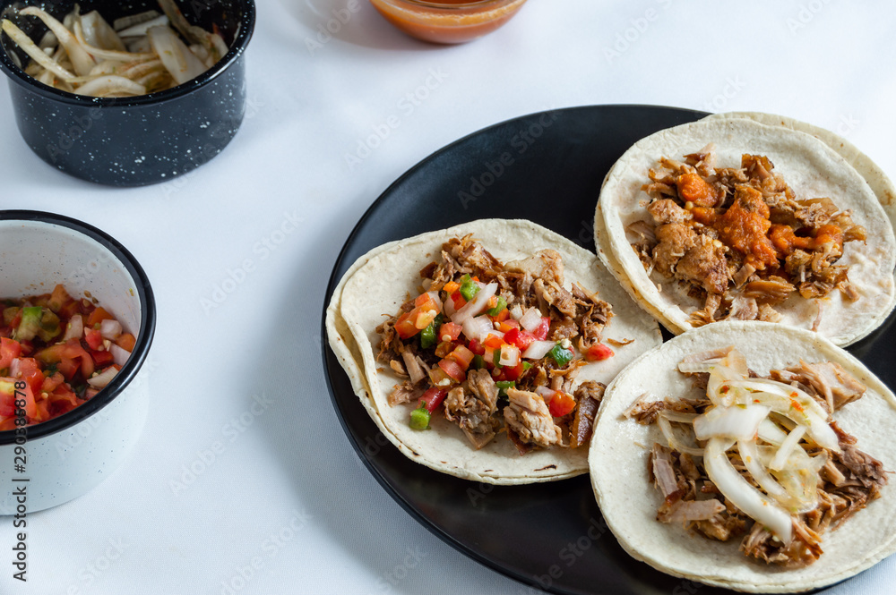 Mexican carnitas tacos, traditional food of Michoacán Mexican carnitas tacos, traditional food of Michoacán
