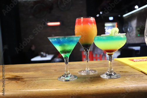 two cocktails on black background
