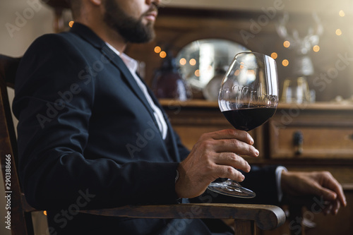 Man with a glass of red wine