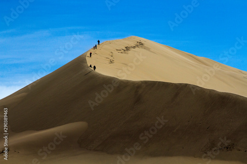 Golden sands of a singing dune in Kazakhstan