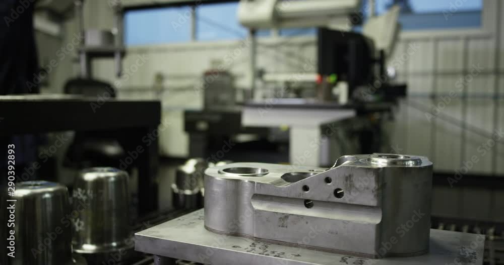 Metal casting in industrial warehouse, pan left Metal casting in industrial warehouse, pan left