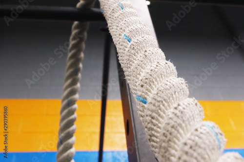 Cuadro en lienzo A twisted rope is taut with the loose ends to hanging in the background