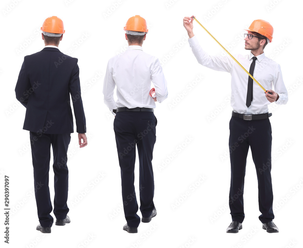 in full growth .a qualified architect in an orange helmet in full growth .a qualified architect in an orange helmet
