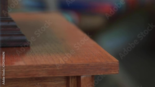 Slow motion, man's hands grabs keys from countertop