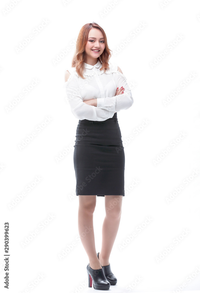 Full length portrait of businesswoman standing with arms folded Full length portrait of businesswoman standing with arms folded