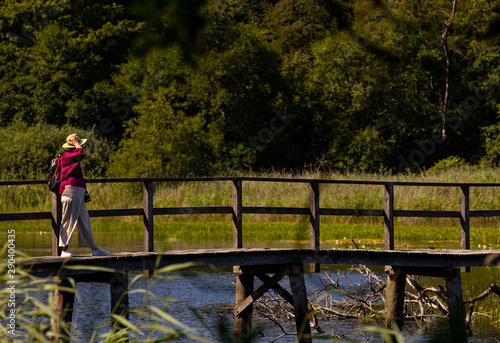 woman on bridge in park, Bornholm