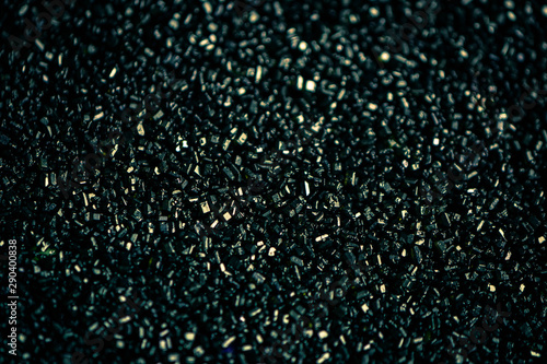 macro close up of black sprinkles sugar