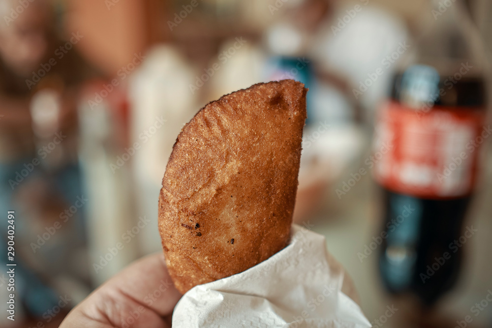 Venezuelan empanadas made of corn meal and stuffed with shredded beef and cheese, deep fried