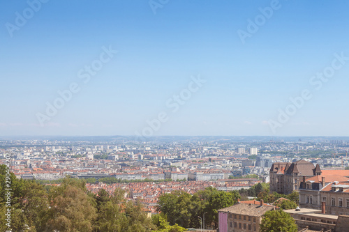 Aerial panoramic view of Lyon with the historic center of the city visible in background and Saone river in the foreground, with the narrow streets of Old Lyon district 