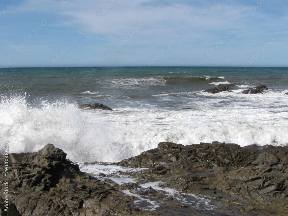 Waves over rocks Waves over rocks