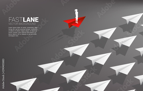 businesswoman standing on red origami paper airplane is move faster than group of white. Business Concept of fast lane for moving and marketing