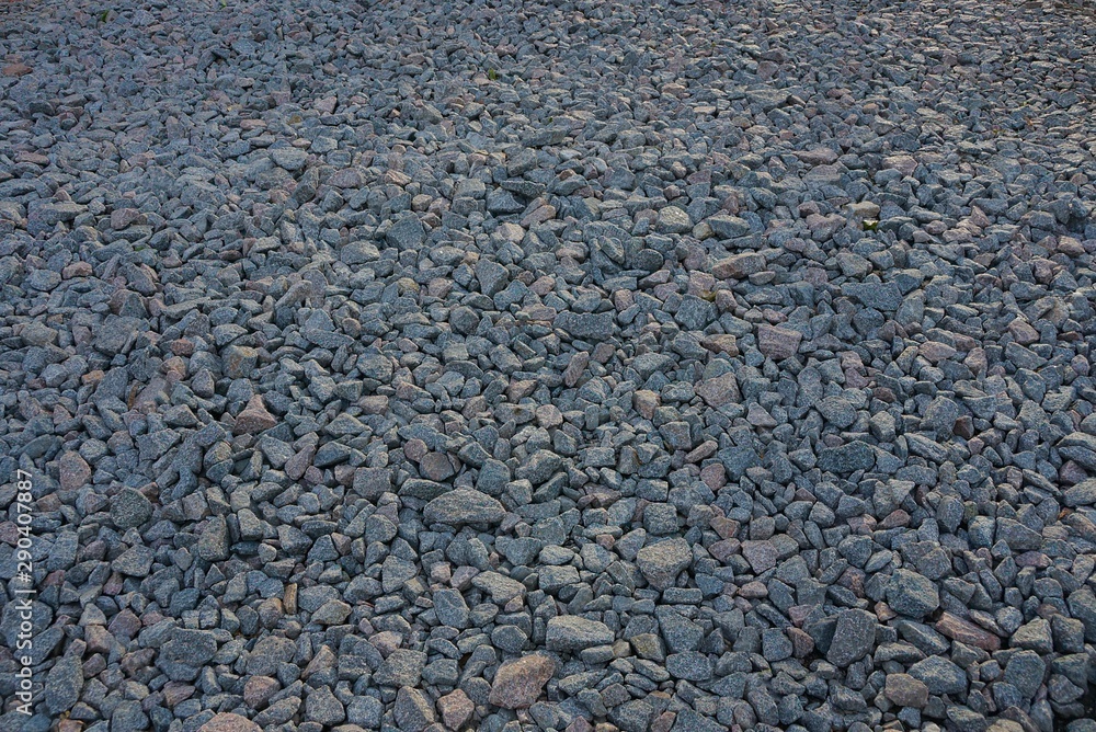 background from a pile of small stones of gray rubble background from a pile of small stones of gray rubble