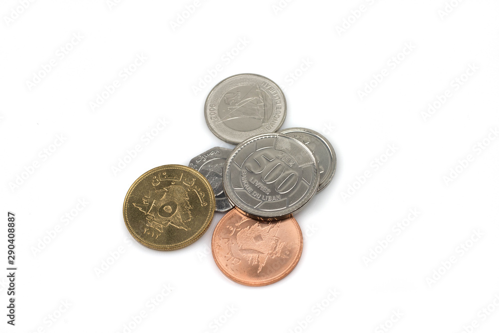 A mixed pile of coins from Lebanon, shot close up in macro, isolated on a clean, white background A mixed pile of coins from Lebanon, shot close up in macro, isolated on a clean, white background