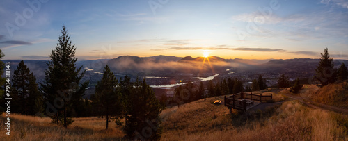 Beautiful Panoramic View of a Canadian City, Kamloops, during a colorful summer sunrise. Located in the Interior British Columbia, Canada. © edb3_16