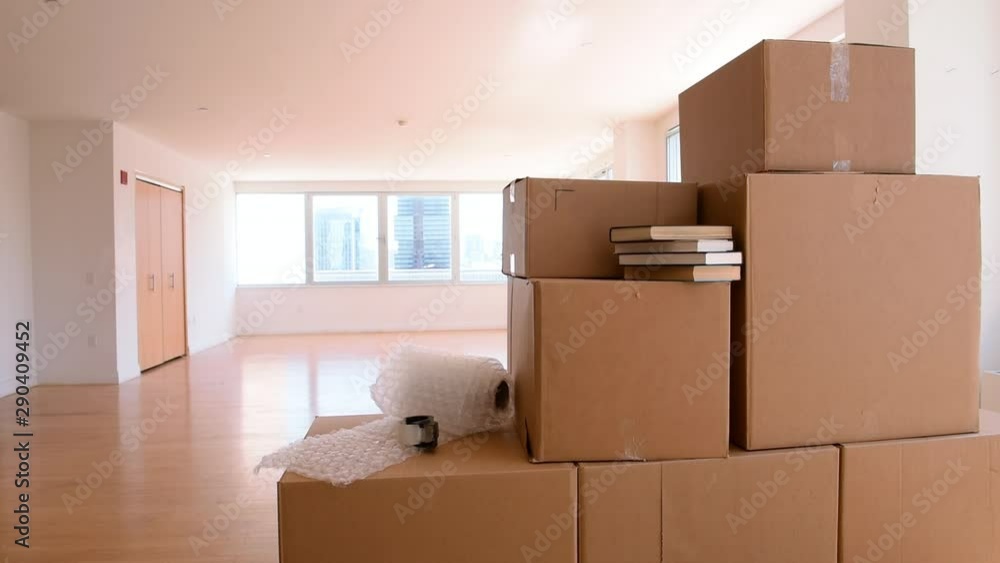 Bubble wrap and cardboard boxes in empty apartment Bubble wrap and cardboard boxes in empty apartment