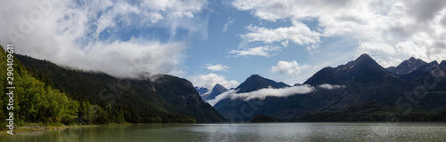 Beautiful Panoramic View of Mud Lake with Mountains in the background. Taken in Blue River, North of Kamloops, British Columbia, Canada.