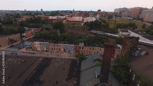 Flying over city rooftops, Baltimore, Maryland, United States