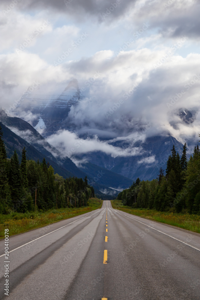 Beautiful View of Yellowhead Highway with Mount Robson in the background during a cloudy summer morning. Taken in British Columbia, Canada. Beautiful View of Yellowhead Highway with Mount Robson in the background during a cloudy summer morning. Taken in British Columbia, Canada.