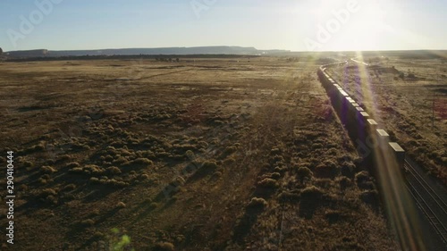 Aerial view of freight train in desert, Gallup, New Mexico, United States