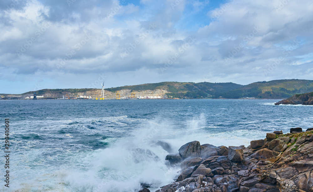 Obraz premium Galician seascape in Coitelada, Ares, La Coruña, Spain. Sea with a lot of waves breaking on the rocks