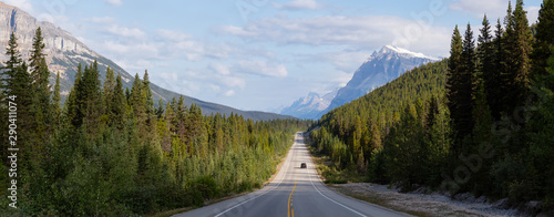 Panoramic View of a Scenic road in the Canadian Rockies during a vibrant sunny and cloudy summer morning. Taken in Icefields Parkway, Banff National Park, Alberta, Canada.
