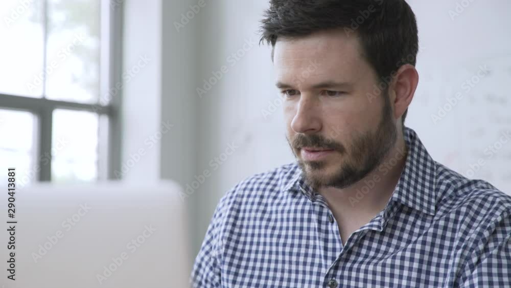 Caucasian businessman video chatting on laptop Caucasian businessman video chatting on laptop