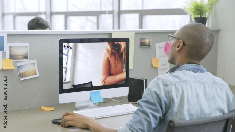 Businesswoman arriving for video chat with businessman Businesswoman arriving for video chat with businessman