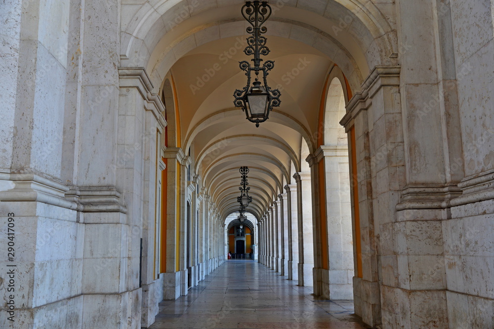 Beautiful lanterns hanging at the archway of The Praca do Comercio (Commerce Square) in Lisbon, Portugal