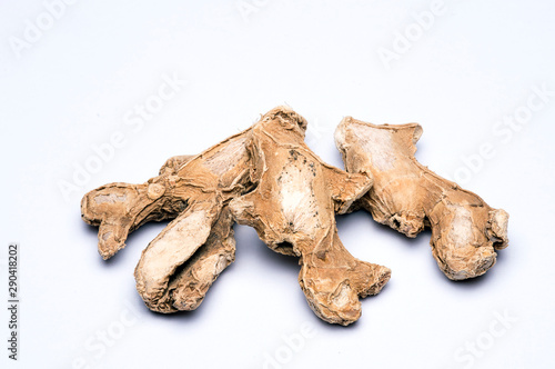 Closeup of dry ginger on white background