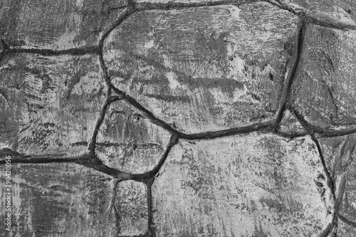 Rock brick wall tiling mechanism background. Nature. Photo